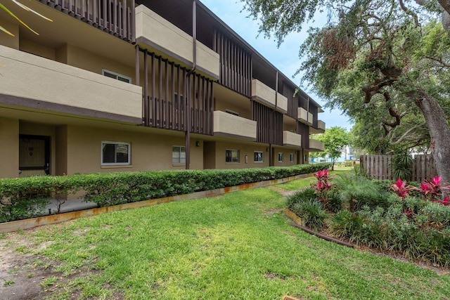 1241 S Martin Luther King Jr Ave Unit 302, Clearwater, FL 33756 - view of property featuring fence