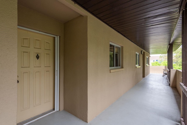 1241 S Martin Luther King Jr Ave Unit 302, Clearwater, FL 33756 - entrance to property with covered porch and stucco siding