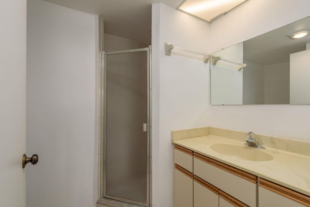 1241 S Martin Luther King Jr Ave Unit 302, Clearwater, FL 33756 - bathroom with a stall shower and vanity