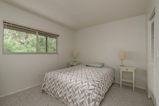 1241 S Martin Luther King Jr Ave Unit 302, Clearwater, FL 33756 - bedroom featuring carpet floors and baseboards
