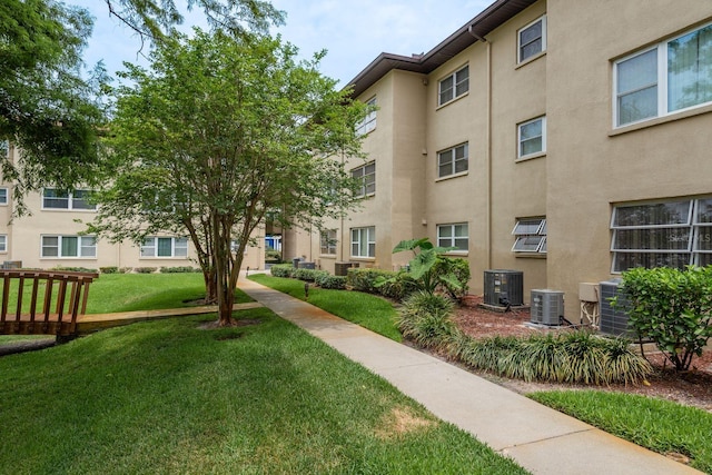1241 S Martin Luther King Jr Ave Unit 302, Clearwater, FL 33756 - view of home's community featuring a lawn