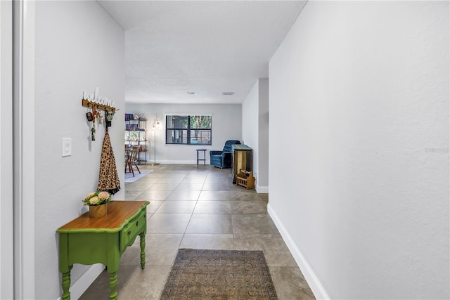 4821 S Gachet Blvd, Lakeland, FL 33813 - hall with baseboards and tile patterned floors