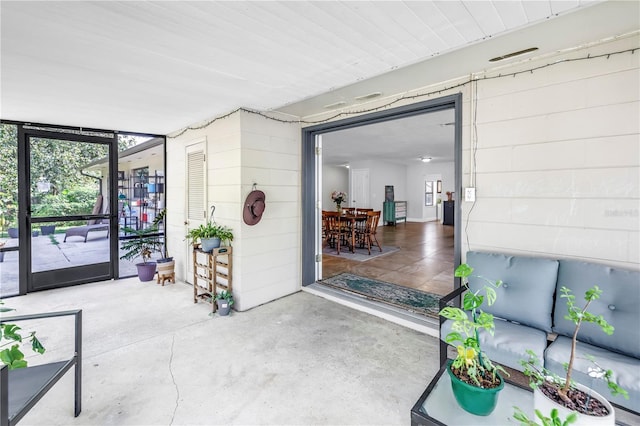 4821 S Gachet Blvd, Lakeland, FL 33813 - doorway to property featuring a patio area