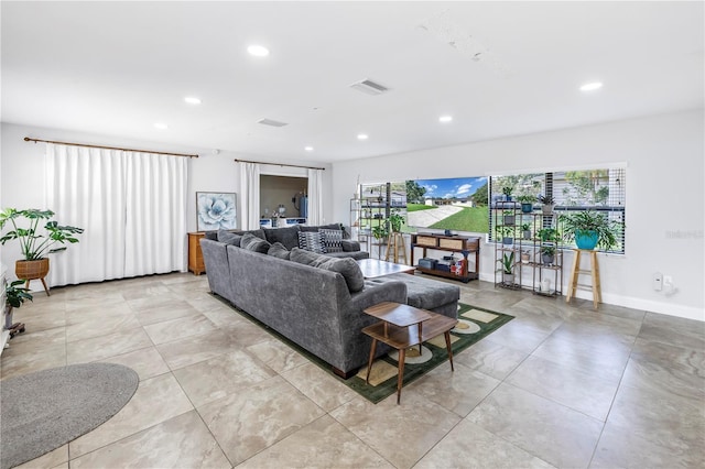 4821 S Gachet Blvd, Lakeland, FL 33813 - living area with plenty of natural light, recessed lighting, and baseboards