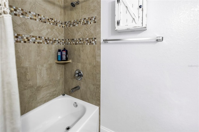 4821 S Gachet Blvd, Lakeland, FL 33813 - bathroom featuring bathing tub / shower combination and baseboards