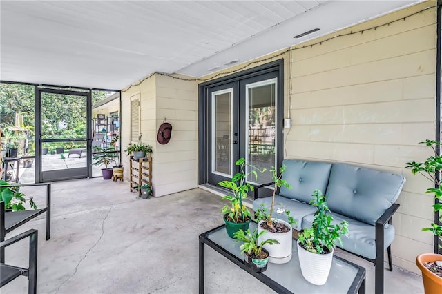 4821 S Gachet Blvd, Lakeland, FL 33813 - sunroom featuring an outdoor living space and french doors