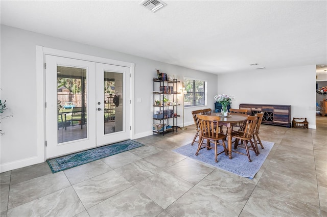 4821 S Gachet Blvd, Lakeland, FL 33813 - dining space featuring french doors and baseboards