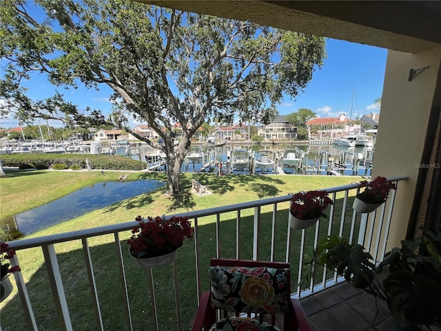 balcony featuring a water view