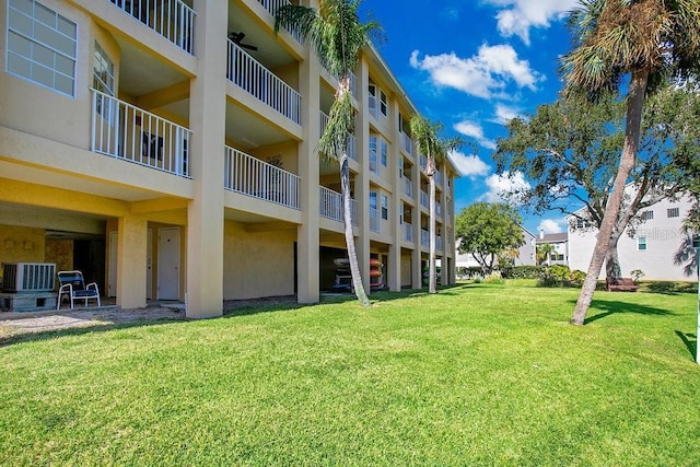 view of apartment building / complex with cooling unit