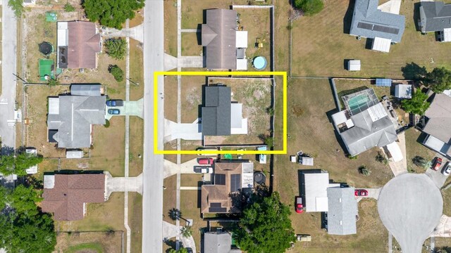 view of property location featuring property boundaries highlighted and nearby suburban area