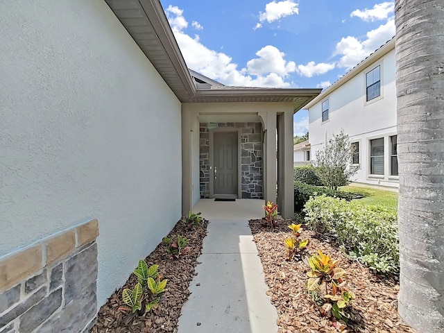 4063 Medicci Ln, Wesley Chapel, FL 33543 - entrance to property with stucco siding
