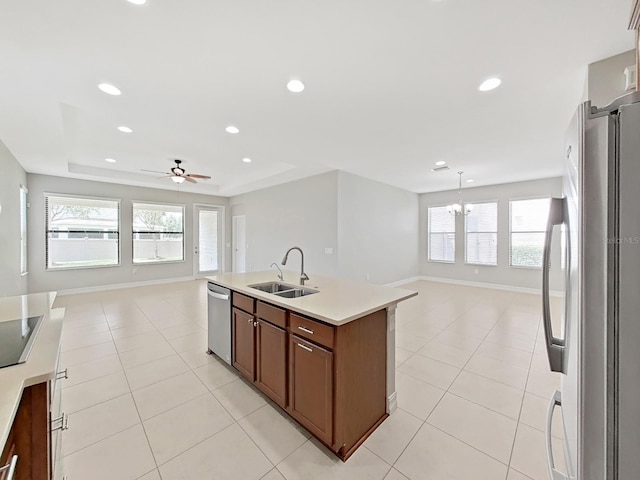 4063 Medicci Ln, Wesley Chapel, FL 33543 - kitchen featuring a sink, open floor plan, appliances with stainless steel finishes, plenty of natural light, and recessed lighting