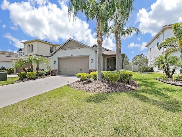 4063 Medicci Ln, Wesley Chapel, FL 33543 - view of front of house with stucco siding, driveway, and an attached garage