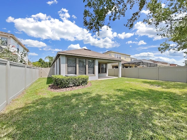 4063 Medicci Ln, Wesley Chapel, FL 33543 - back of house with stucco siding and a patio