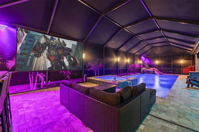 home theater room with lofted ceiling