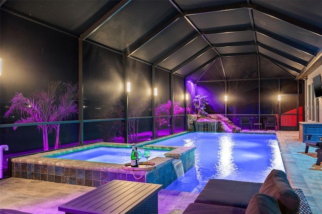 view of pool featuring a pool with connected hot tub and a patio