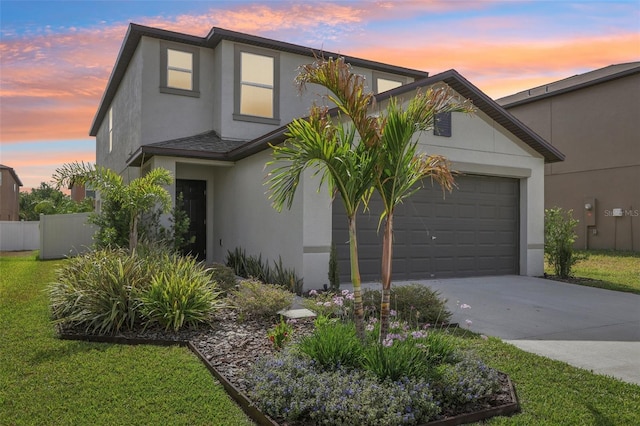 6398 Bar S Bar Trl, Zephyrhills, FL 33541 - view of front of property featuring stucco siding, driveway, and a garage