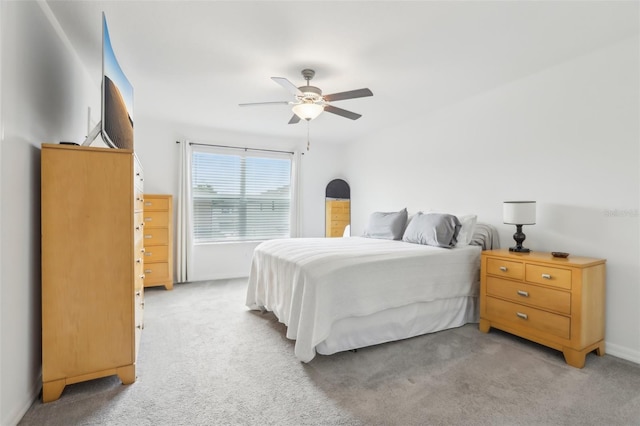6398 Bar S Bar Trl, Zephyrhills, FL 33541 - bedroom with light carpet and ceiling fan