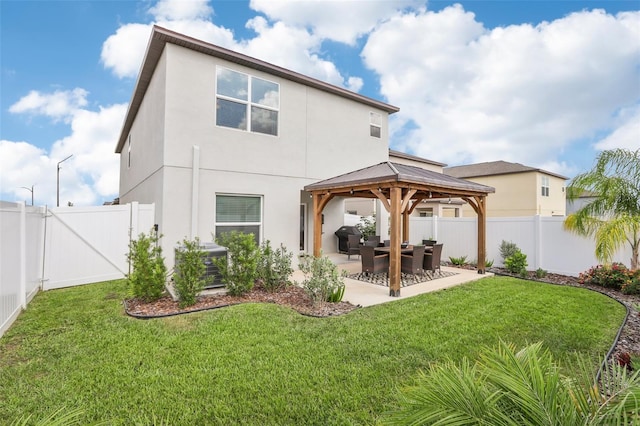 6398 Bar S Bar Trl, Zephyrhills, FL 33541 - rear view of property with a gazebo, stucco siding, and a patio