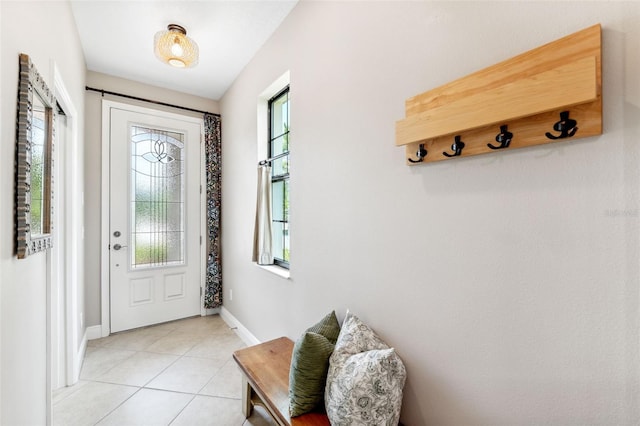 3877 Burdick Loop, Odessa, FL 33556 - doorway to outside with light tile patterned floors and baseboards