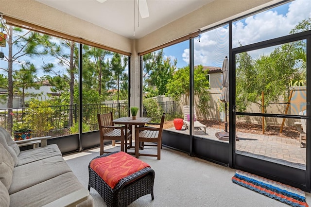 3877 Burdick Loop, Odessa, FL 33556 - sunroom featuring ceiling fan and an outdoor hangout area