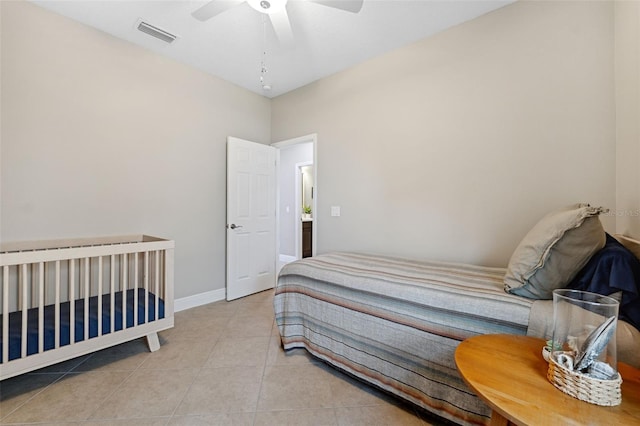 3877 Burdick Loop, Odessa, FL 33556 - tiled bedroom featuring ceiling fan and baseboards