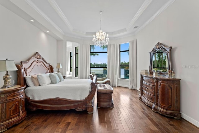 17124 Crawley Rd, Odessa, FL 33556 - bedroom with a raised ceiling, a chandelier, dark wood finished floors, crown molding, and recessed lighting