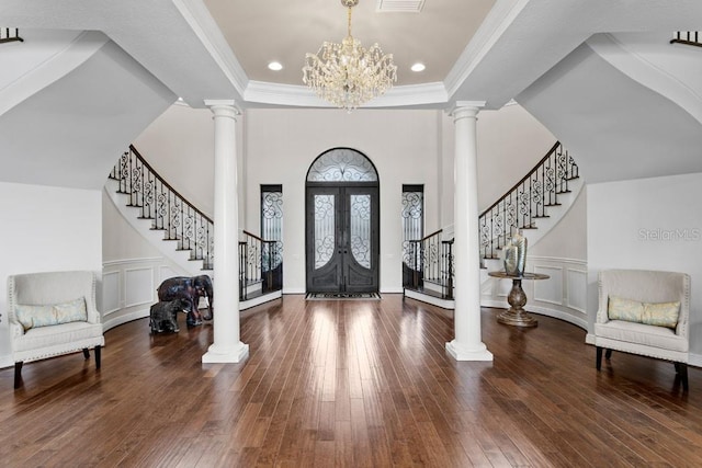 17124 Crawley Rd, Odessa, FL 33556 - entryway featuring stairway, ornate columns, wood-type flooring, a raised ceiling, and recessed lighting