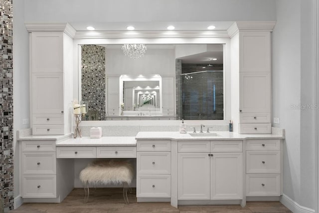 17124 Crawley Rd, Odessa, FL 33556 - bathroom with a shower stall, vanity, a chandelier, wood finished floors, and recessed lighting