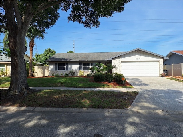 3357 Hunt Club Dr, Clearwater, FL 33761 - ranch-style home featuring a garage and driveway