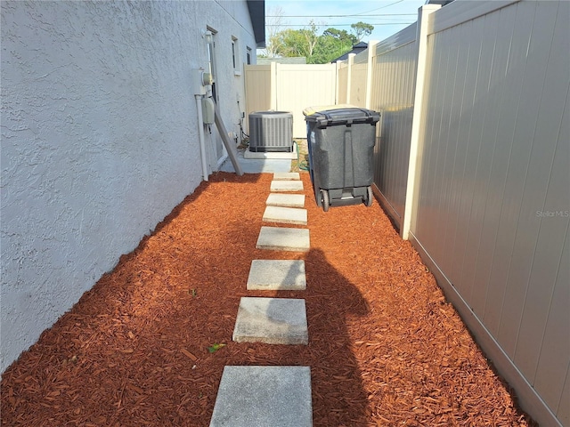 3357 Hunt Club Dr, Clearwater, FL 33761 - view of yard with central AC unit