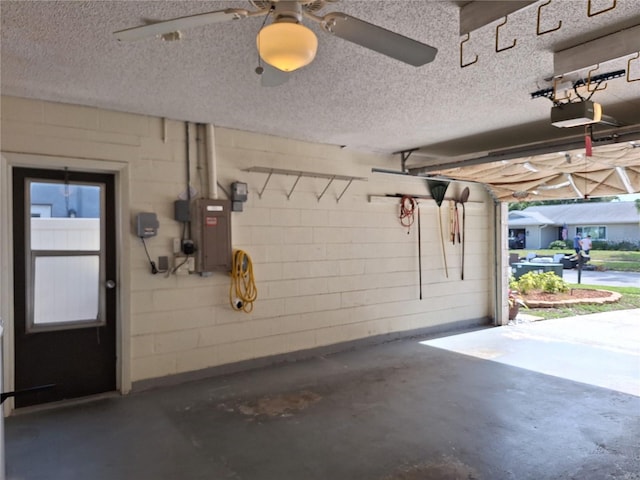 3357 Hunt Club Dr, Clearwater, FL 33761 - garage with a garage door opener and concrete block wall