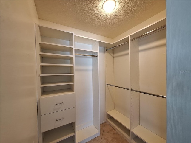3357 Hunt Club Dr, Clearwater, FL 33761 - walk in closet with light tile patterned floors