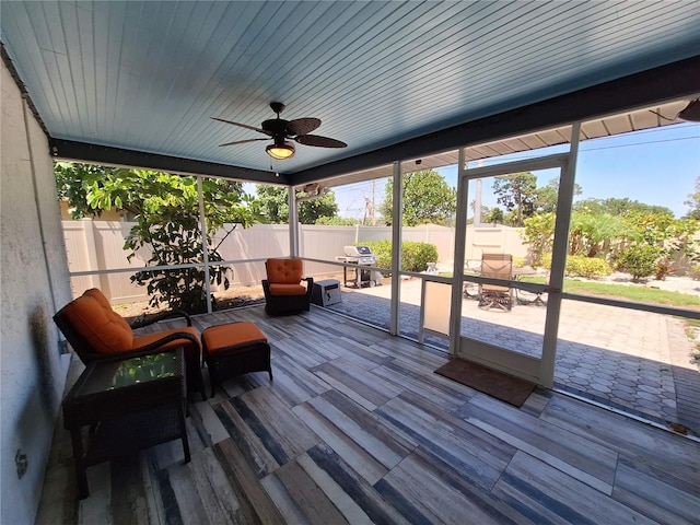 3357 Hunt Club Dr, Clearwater, FL 33761 - sunroom with a ceiling fan and outdoor dining area
