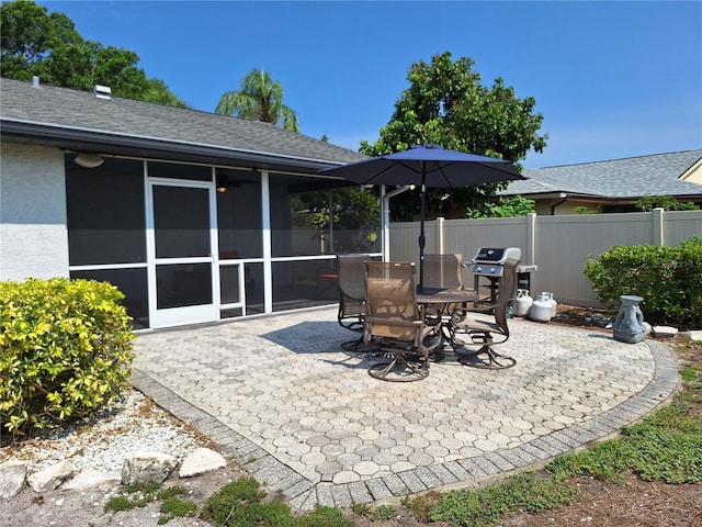 3357 Hunt Club Dr, Clearwater, FL 33761 - view of patio / terrace with a sunroom and outdoor dining area
