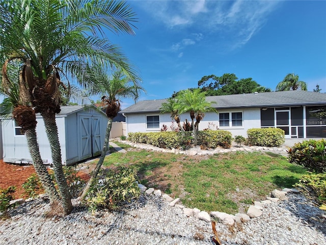 3357 Hunt Club Dr, Clearwater, FL 33761 - view of front of property with a sunroom and stucco siding