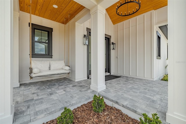 3515 Powerline Rd, Lithia, FL 33547 - property entrance with board and batten siding and covered porch