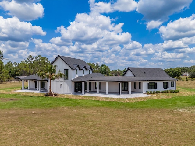 3515 Powerline Rd, Lithia, FL 33547 - back of property with a patio and a yard