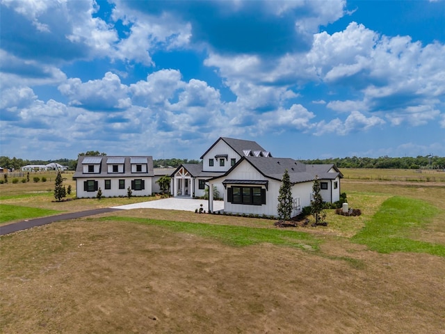 3515 Powerline Rd, Lithia, FL 33547 - modern farmhouse featuring driveway and a front yard