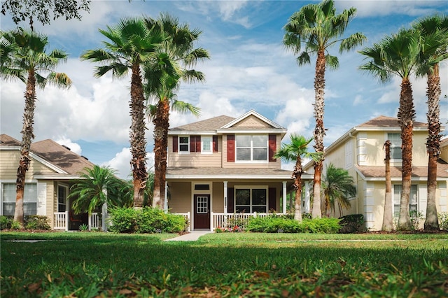 20039 Heritage Point Dr, Tampa, FL 33647 - view of front facade with a porch and a front yard