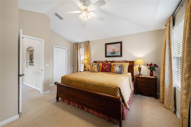 20039 Heritage Point Dr, Tampa, FL 33647 - bedroom featuring lofted ceiling, light colored carpet, baseboards, a closet, and ceiling fan