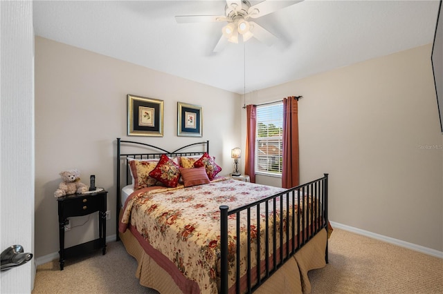 20039 Heritage Point Dr, Tampa, FL 33647 - bedroom featuring light carpet, baseboards, and a ceiling fan