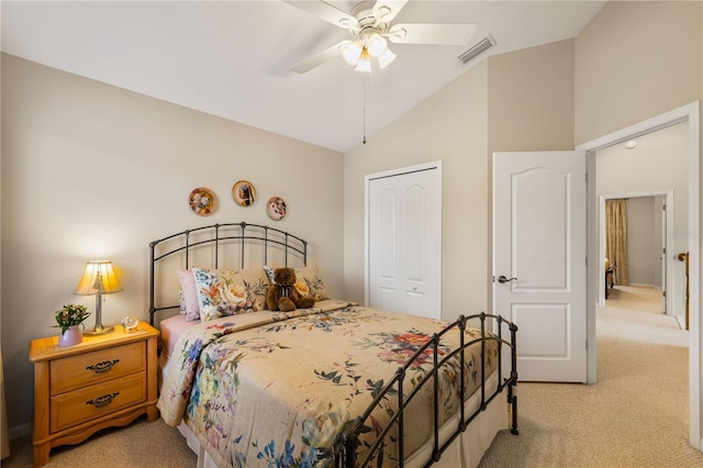 20039 Heritage Point Dr, Tampa, FL 33647 - bedroom with light carpet, vaulted ceiling, a closet, and ceiling fan