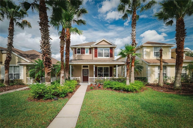 20039 Heritage Point Dr, Tampa, FL 33647 - view of front facade with a porch and a front yard