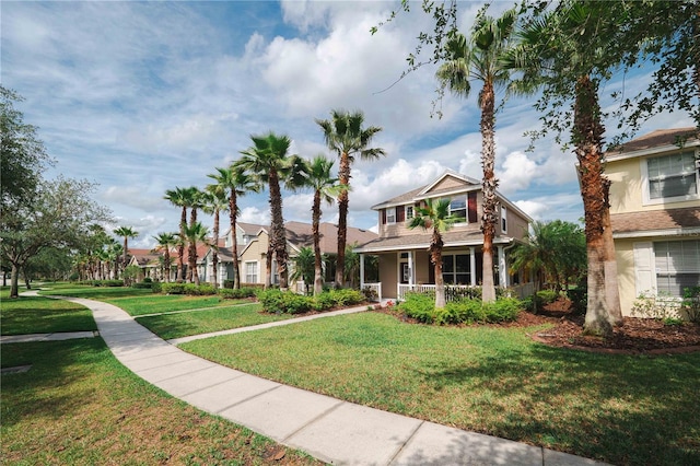 20039 Heritage Point Dr, Tampa, FL 33647 - view of front of home featuring covered porch and a front yard