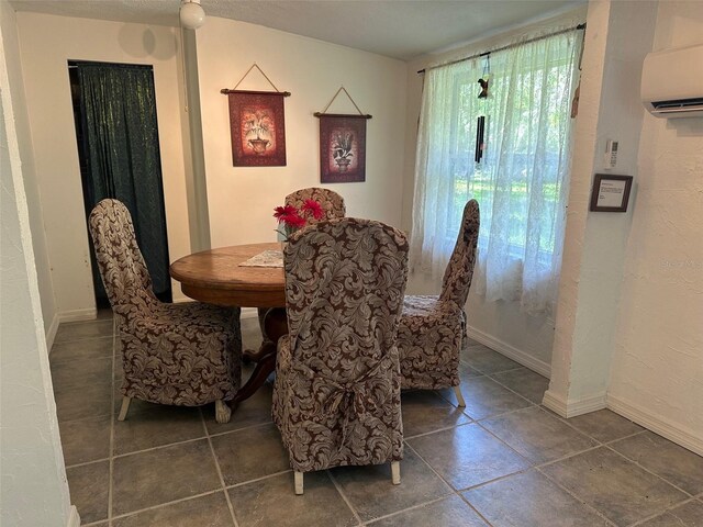 10170 W Yulee Dr, Homosassa, FL 34448 - dining room with a wall mounted air conditioner and baseboards
