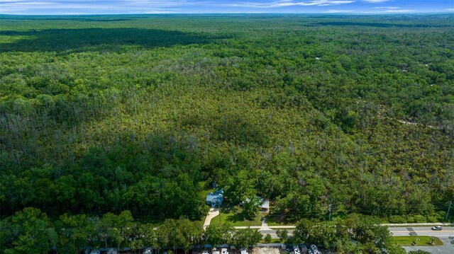 10170 W Yulee Dr, Homosassa, FL 34448 - aerial view of property's location featuring a heavily wooded area