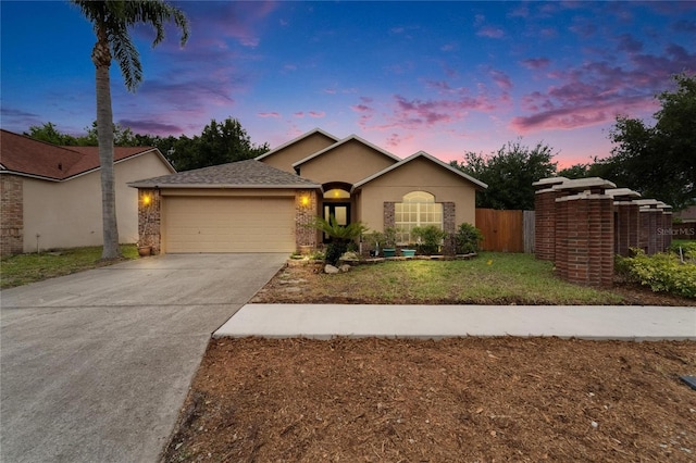 6801 Bishops Pointe Way, Riverview, FL 33578 - ranch-style home featuring a garage, driveway, and stucco siding