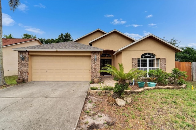 6801 Bishops Pointe Way, Riverview, FL 33578 - ranch-style house with a garage, driveway, and stucco siding