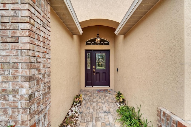 6801 Bishops Pointe Way, Riverview, FL 33578 - doorway to property featuring stucco siding